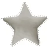 Almofada estrela cinza com pompons