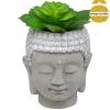 Cabeça buda com planta artificial
